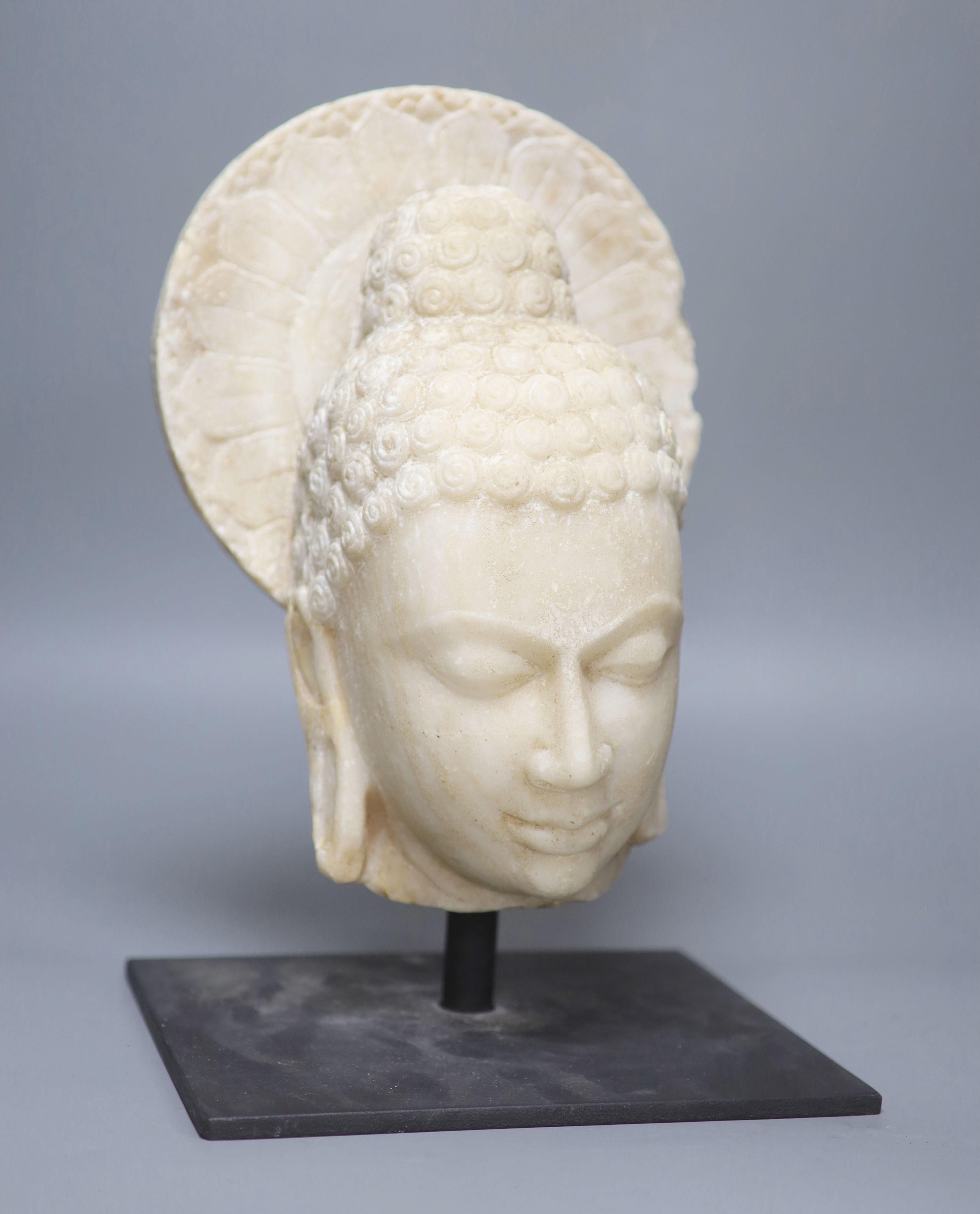 A Gandharan style alabaster head, height 37cm